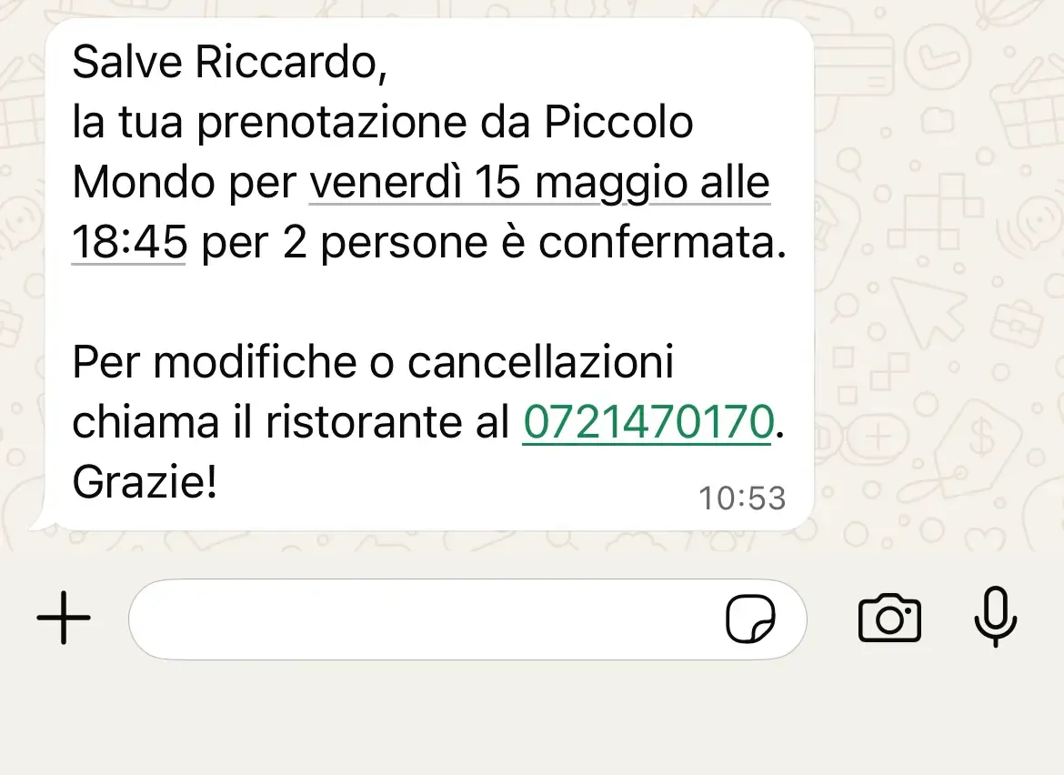 Messaggio di conferma prenotazione ricevuto su WhatsApp Business
